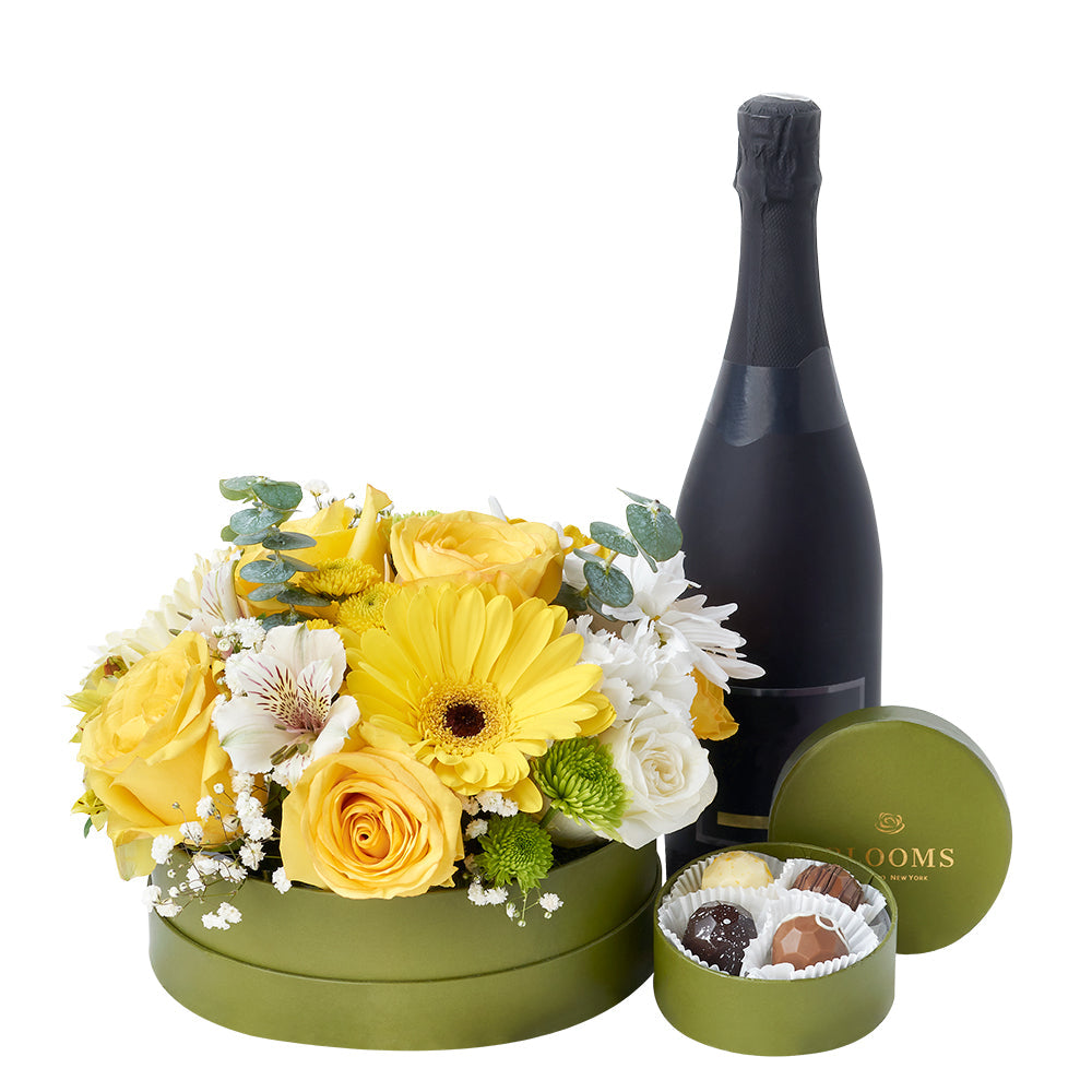 Celebrations Galore Flowers & Champagne Gift, bottle of champagne, a box of chocolates, and a vibrant assortment of blooms featuring roses, alstroemeria, and daisies, Flower Gifts from Canada Blooms- Same Day Canada Delivery.