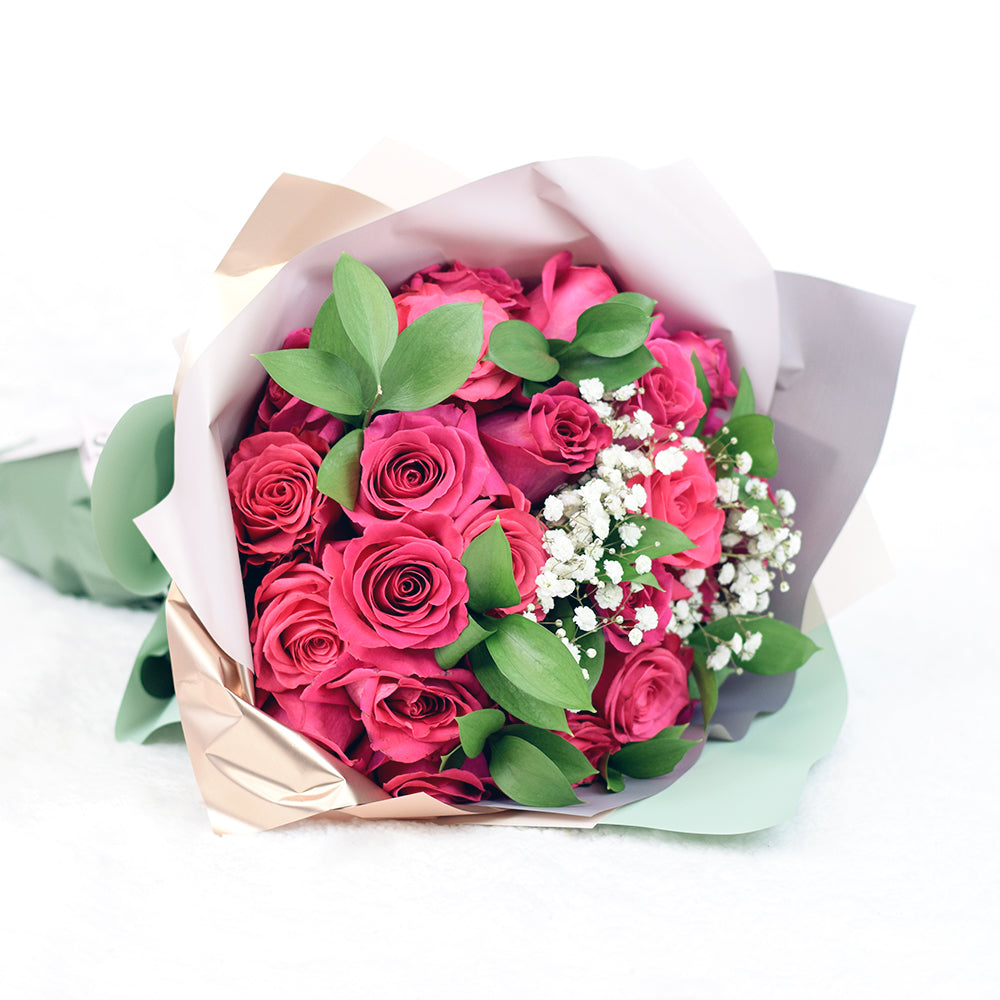 bouquet with pink roses, ruscus and baby's breath wrapped in floral wrap and designer ribbon, – Canada Blooms - Canada Delivery