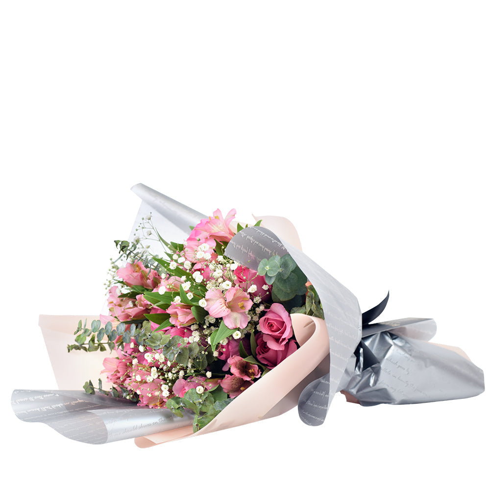 Blushing Notes Mixed Rose Bouquet, selection of pink roses and other filler flowers and leaves beautifully gathered together with designer twine or ribbons in a floral wrap, Flower Gifts from Canada Blooms - Same Day Canada Delivery.