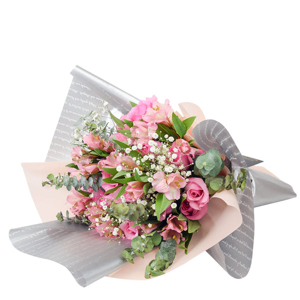 Blushing Notes Mixed Rose Bouquet, selection of pink roses and other filler flowers and leaves beautifully gathered together with designer twine or ribbons in a floral wrap, Flower Gifts from Canada Blooms - Same Day Canada Delivery.