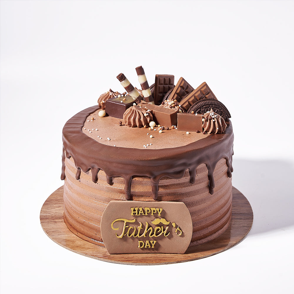 Chocolate Father’s Day Cake, moist and fluffy texture, layered with velvety chocolate buttercream, and adorned with rich chocolate goodies on top, Cake Gifts from Blooms Canada - Same Day Canada Delivery.