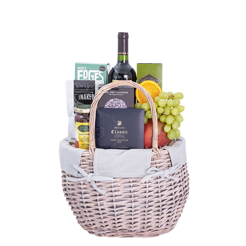 Luxurious Fresh Delights Kosher Wine Gift Basket, delightful assortment of fresh fruit, delectable gourmet snacks, tea, and a bottle of Kosher wine, all elegantly presented in a beautiful wicker market basket, Gourmet Gifts from Canada Blooms - Canada Delivery