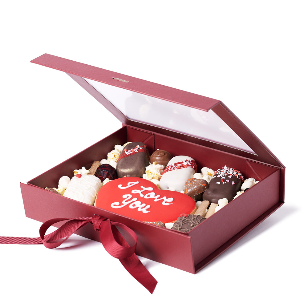 The Valentine’s Day Sweet Treat Gift Box, 6 assorted truffles, a heart-shaped cookie, 5 brownies, marshmallows, and popcorn, Holiday gifts from Canada Blooms - Canada Delivery