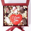 The Valentine’s Day Sweet Treat Gift Box, 6 assorted truffles, a heart-shaped cookie, 5 brownies, marshmallows, and popcorn, Holiday gifts from Blooms Canada - Same Day Canada Delivery.