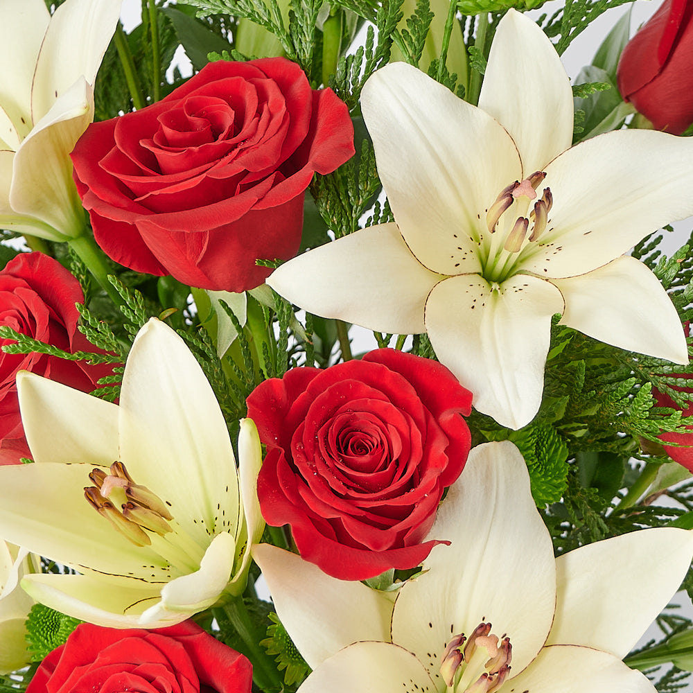 Winter Flower Arrangement, red roses, white lilies, and greenery in a pot, Flower Gifts from Canada Blooms - Canada Delivery
