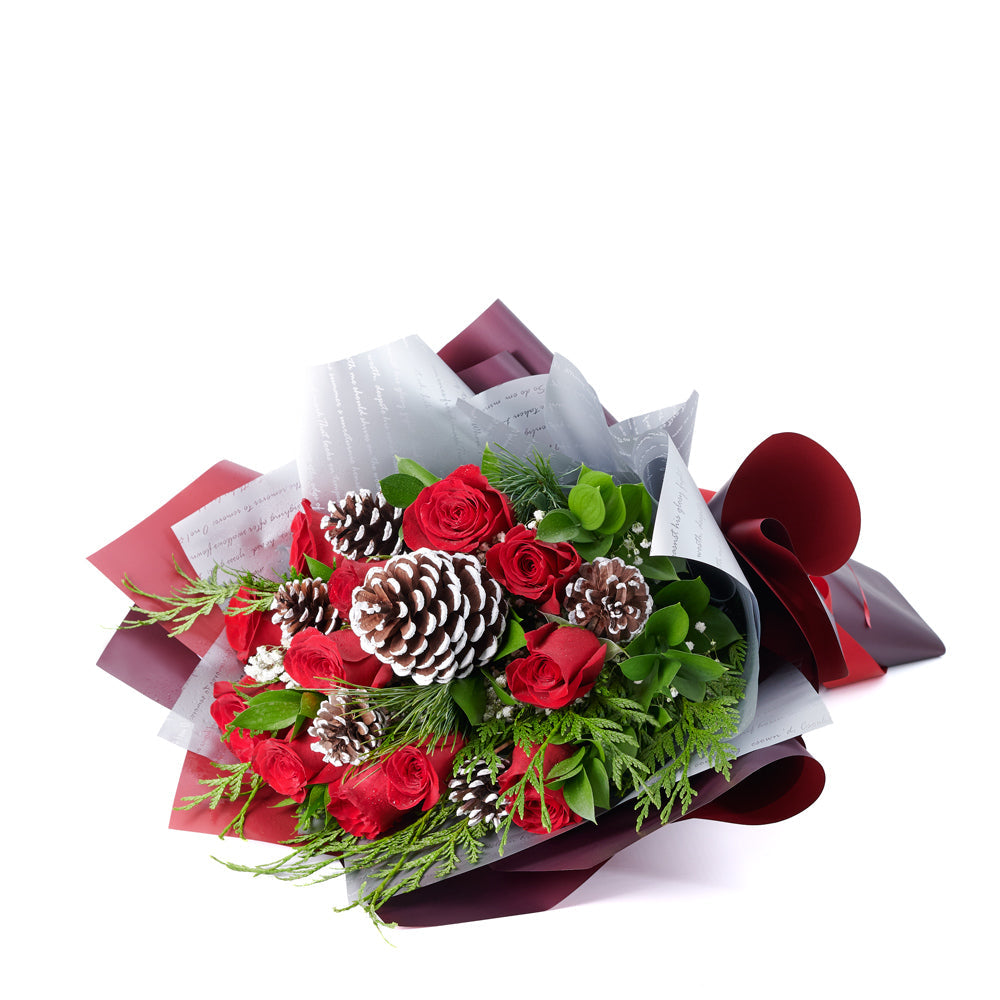 Winter Rose Bouquet, roses, pine cones, baby’s breath, and greens in a floral wrap and tied with a beautiful designer ribbon, Flower Gifts from Canada Blooms - Canada Delivery