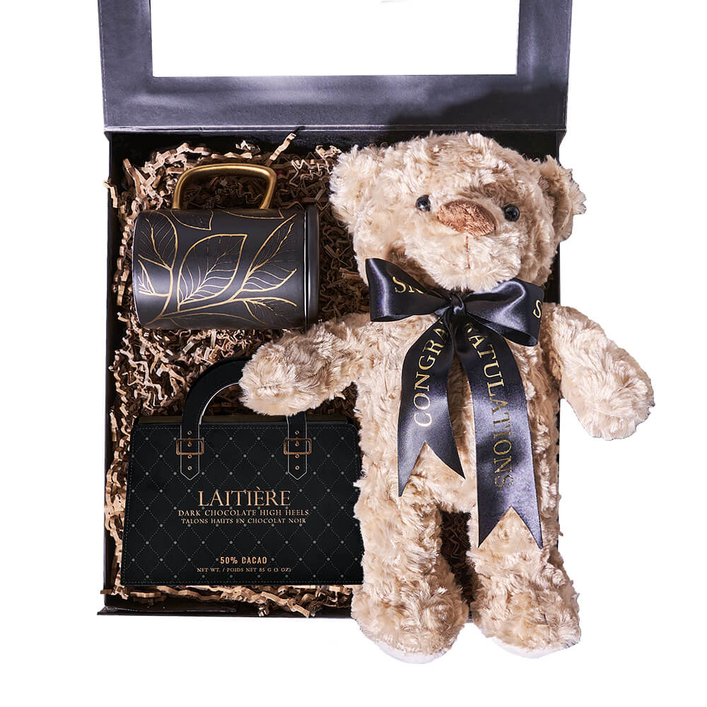You're a Graduate! Chocolate & Teddy Gift, black & gold mug, dark chocolate high heels, a plush teddy bear, and a presentation gift box, Graduation Gifts from Canada Blooms - Same Day Canada Delivery.