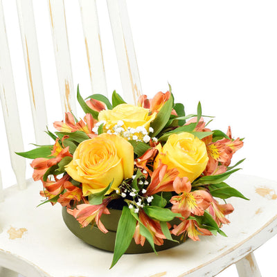 Autumnal floral hat box arrangement in yellows and oranges. Same Day Blooms Canada Delivery.