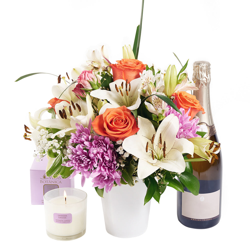 Beautifully Fragrant Flowers & Champagne Gift, roses, daisies, lilies, alstroemeria, and greens in a ceramic vessel, Lavender scented candle, a bottle of Sparkling Wine, Flower Gifts from Canada Blooms - Same Day Canada Delivery.