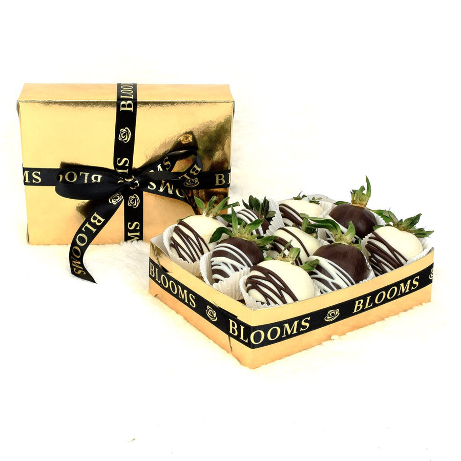 Berry Drizzle Chocolate Dipped Strawberries, 9 strawberries covered in dark chocolate and milk chocolate and drizzled with white and dark chocolate on top. These strawberries come packed in a stylized gold coloured box for gifting, Fruit Gifts from Canada Blooms - Same Day Canada Delivery.