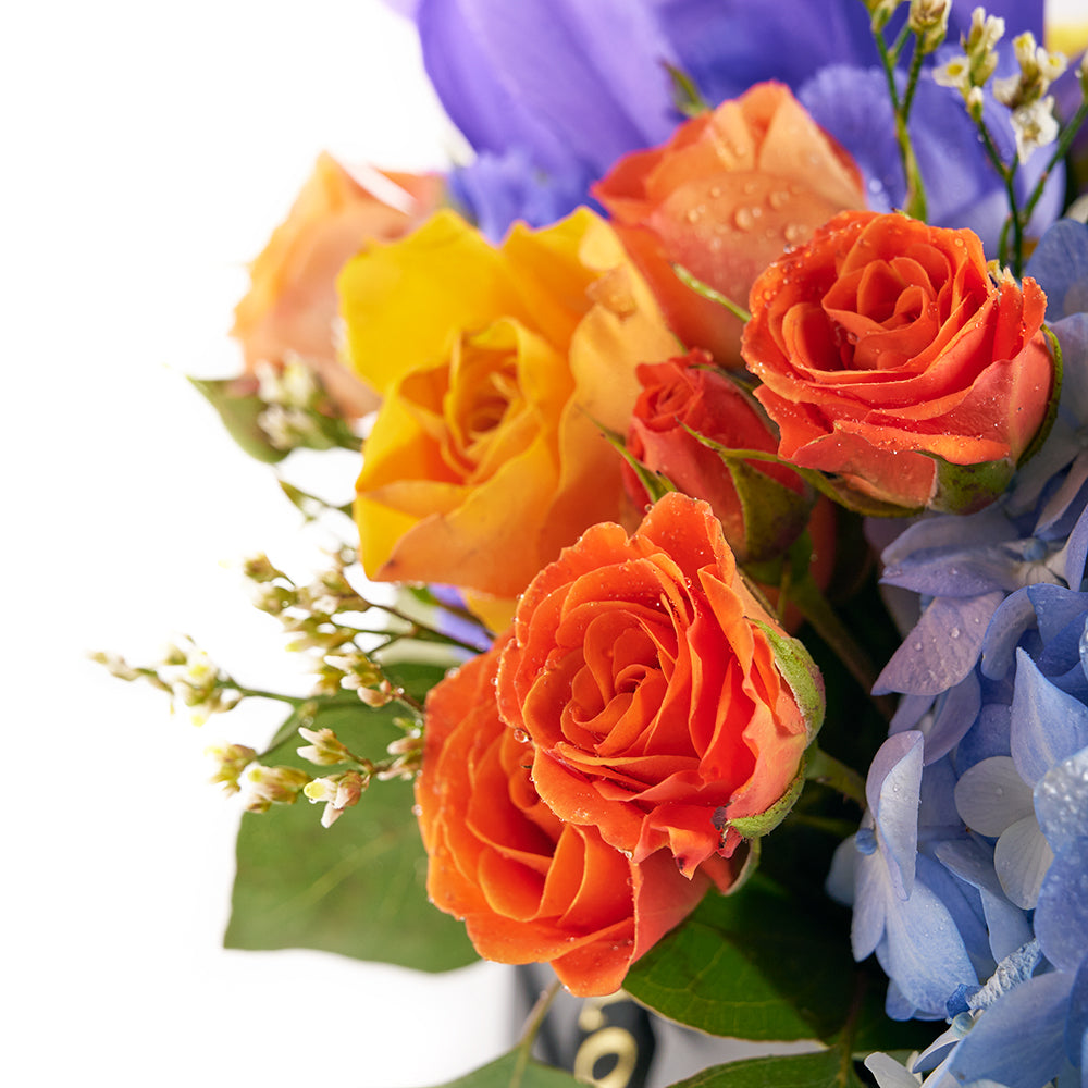 Bursting Beauty Iris Box Arrangement, contrasting roses, irises, hydrangea, and lilies, assorted selection of roses, irises, spray roses, hydrangea, lily, and greens gathered together in a stylish box, Flower Gifts from Canada Blooms - Same Day Canada Delivery.