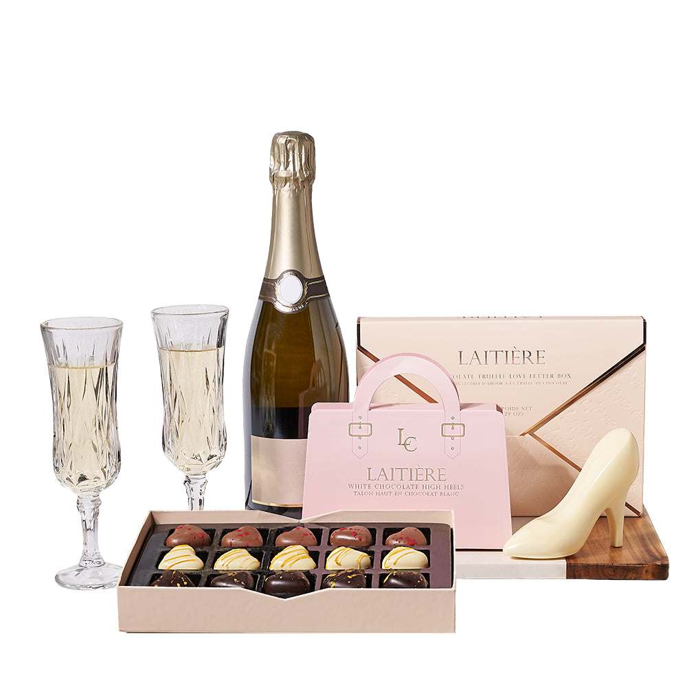 Champagne & Sharable Love Letter Gift, bottle of sparkling wine, two champagne flutes, a set of white chocolate high heels, a love letter box of chocolate truffles, and a marble & wood serving board, Gourmet Gifts from Canada Blooms- Same Day Canada Delivery.