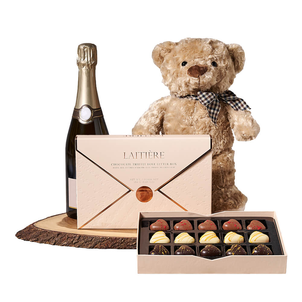 Champagne &amp; Teddy Chocolate Gift, bottle of sparkling wine, a love letter box of chocolate truffles, a plush teddy bear toy, and a live-edge serving board, Champagne Gifts from Canada Blooms - Same Day Canada Delivery.