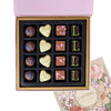 Champagne & Truffles for Two, bottle of sparkling wine, a box of chocolate truffles with tea-inspired flavors, and a pair of champagne flutes, Gourmet Gifts from Blooms Canada - Same Day Canada Delivery.