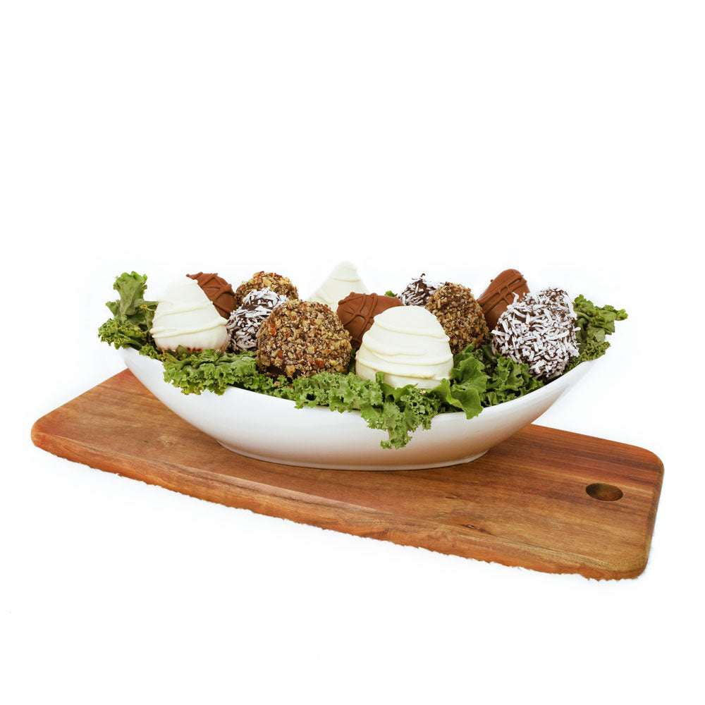 Crunchy Chocolate Dipped Strawberries, 12 strawberries covered in dark chocolate and white chocolate and selectively coated in nuts. The strawberries come arranged in a wide, white dish for display, Fruit Gifts from Canada Blooms - Canada Delivery
