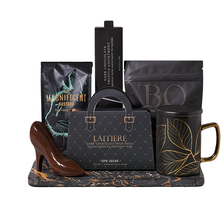 Dark Chocolate Delight Gift Set, black and gold mug, a bag of coffee, assorted dark chocolate truffles, dark chocolate high heels, dark chocolate mocha shortbread cookies, and a marble serving board, Gourmet Gifts from Blooms Canada - Same Day Canada Delivery.