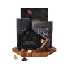 Dark Chocolate Variety Gift Board, bar of dark chocolate, dark chocolate chip mocha shortbread cookies, dark chocolate high heels, champagne-inspired chocolate truffles, and a beautiful hexagonal end-grain cutting board, Gourmet Gifts from Blooms Canada - Same Day Canada Delivery.