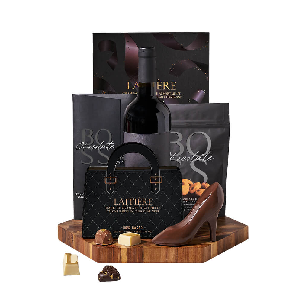 Dark Chocolate &amp; Wine Gift Board, bottle of wine, a bar of dark chocolate, dark chocolate chip mocha shortbread cookies, dark chocolate high heels, champagne-inspired chocolate truffles, and a beautiful hexagonal end-grain cutting board, Gourmet Gifts from Canada Blooms - Canada Delivery
