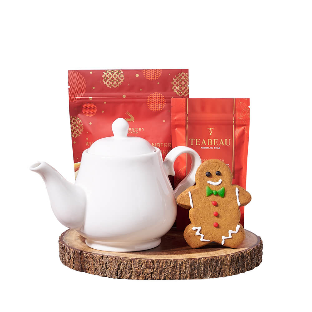 Gingerbread & Holiday Tea Gift, classic gingerbread man cookie, warmly spiced cinnamon tea, white chocolate cranberry shortbread cookies, a ceramic teapot, and a live-edge serving board, Holiday Gifts from Canada Blooms - Canada Delivery