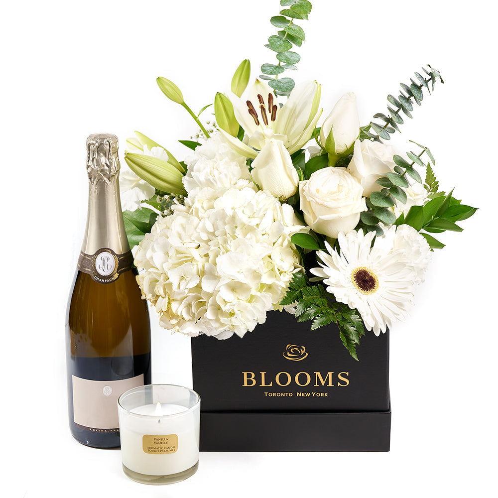 Heavenly Scents Flowers & Champagne Gift, stunning mixed floral arrangement of lilies and roses, a vanilla-scented candle, and a bottle of sparkling wine, Flower Gifts from Canada Blooms - Canada Delivery