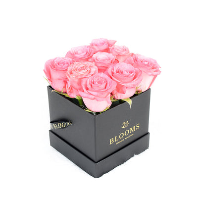 Impeccable pink rose hat box arrangement. Same Day Blooms Canada Delivery.