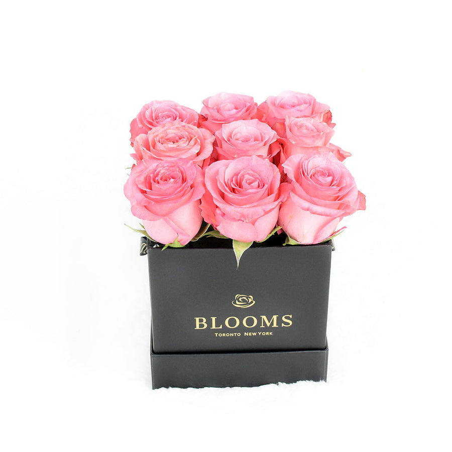 Impeccable pink rose hat box arrangement. Same Day Blooms Canada Delivery. 