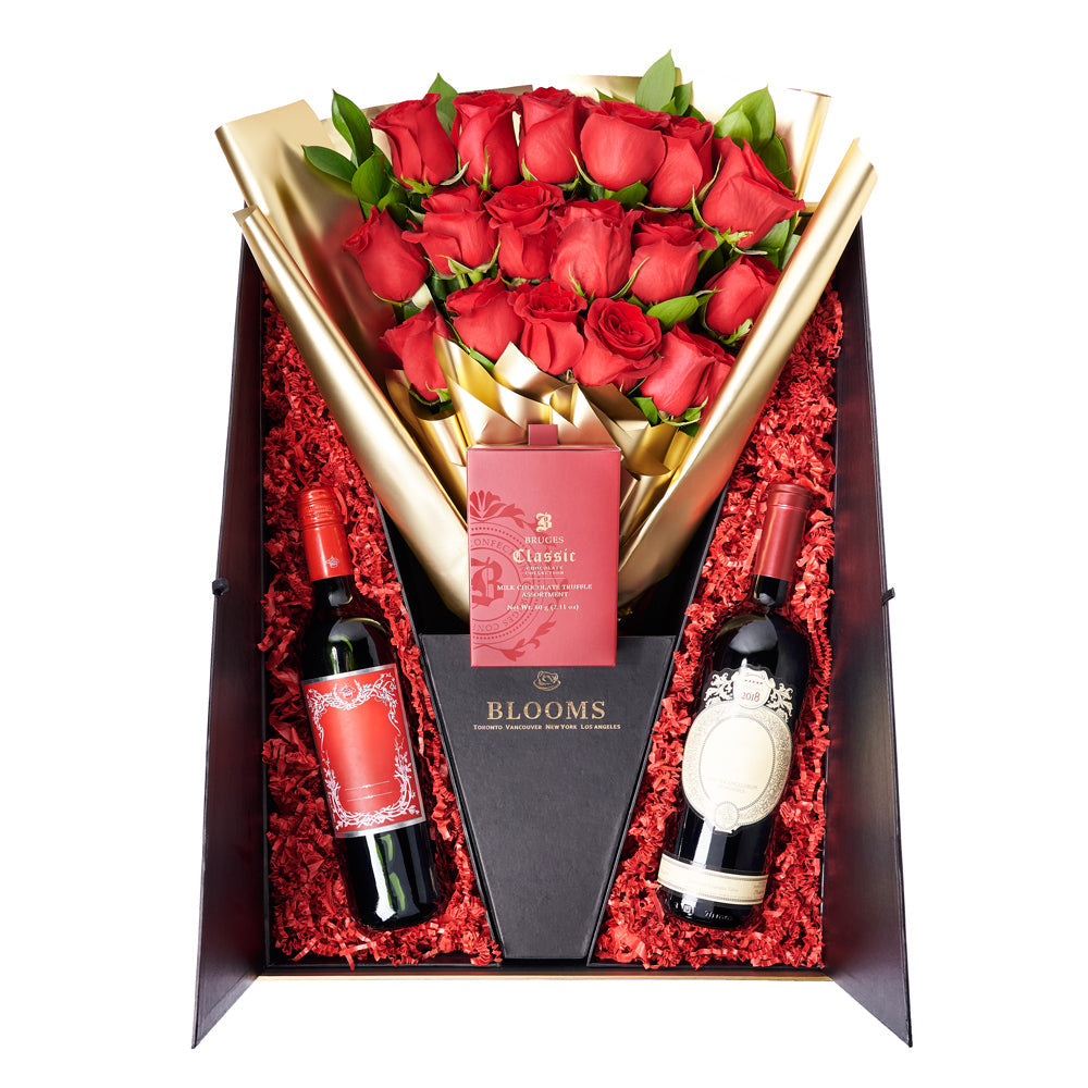 Valentine's Day 18 Stem Red Roses With Chocolate & Wine, 18 red roses gathered together with Salal and Baby’s Breath in a floral wrap and tied with designer ribbon inside a sleek black designer box with chocolate truffles and two bottles of wine, Holiday gifts from Canada Blooms - Canada Delivery