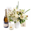 Love's Eternal Mixed Bouquet Gift Set, white arrangement includes roses, lilies, baby’s breath, and greens in a ceramic vase, bottle of Sparkling Wine, vanilla scented candle, Flower Gifts from Blooms Canada - Same Day Canada Delivery.