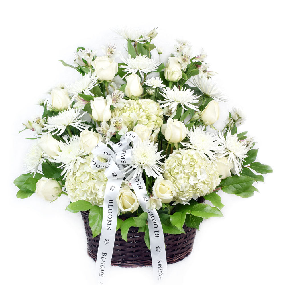 Luminous white mixed flower arrangement in basket – Canada Blooms - Canada Delivery