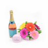 Daisy floral arrangement with champagne and chocolate truffles. Same Day Canada Delivery.