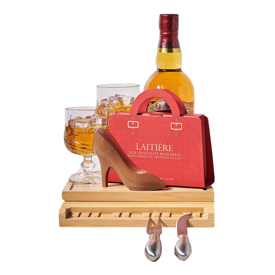 Spirits & Chocolate Heel Set, bottle of liquor, two snifter glasses, a set of milk chocolate high heels, and a grand piano serving board with tools inside, Gourmet Gifts from Blooms Canada - Same Day Canada Delivery.