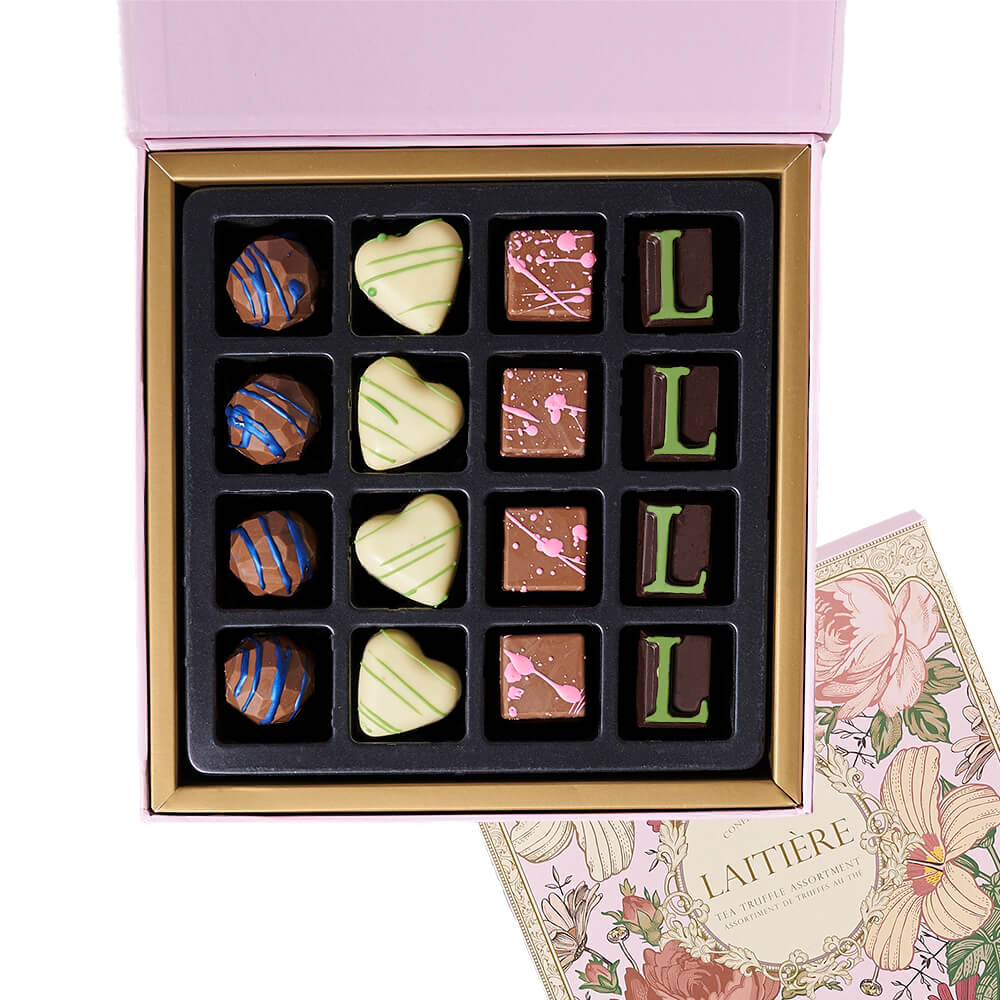 Tantalizing Tea Gift Box, vanilla chai tea, Earl Grey tea, English Breakfast tea, an assortment of macarons, a box of tea-inspired chocolate truffles, and a charming gift box, Tea Gifts from Canada Blooms - Canada Delivery