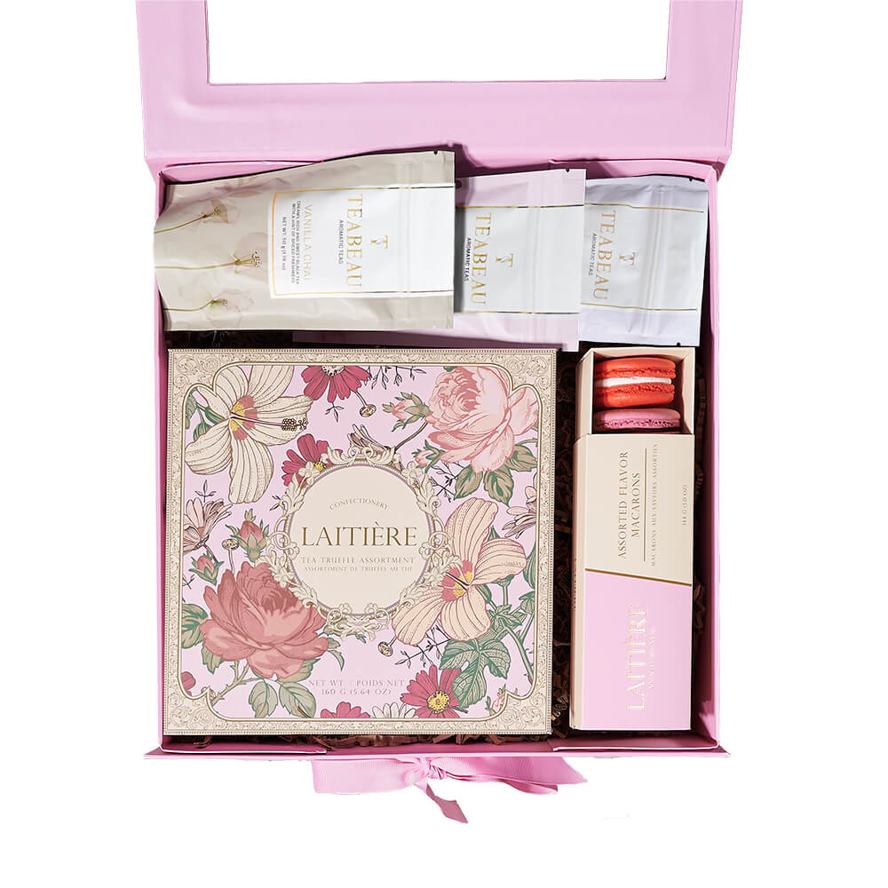 Tantalizing Tea Gift Box, vanilla chai tea, Earl Grey tea, English Breakfast tea, an assortment of macarons, a box of tea-inspired chocolate truffles, and a charming gift box, Tea Gifts from Canada Blooms - Canada Delivery