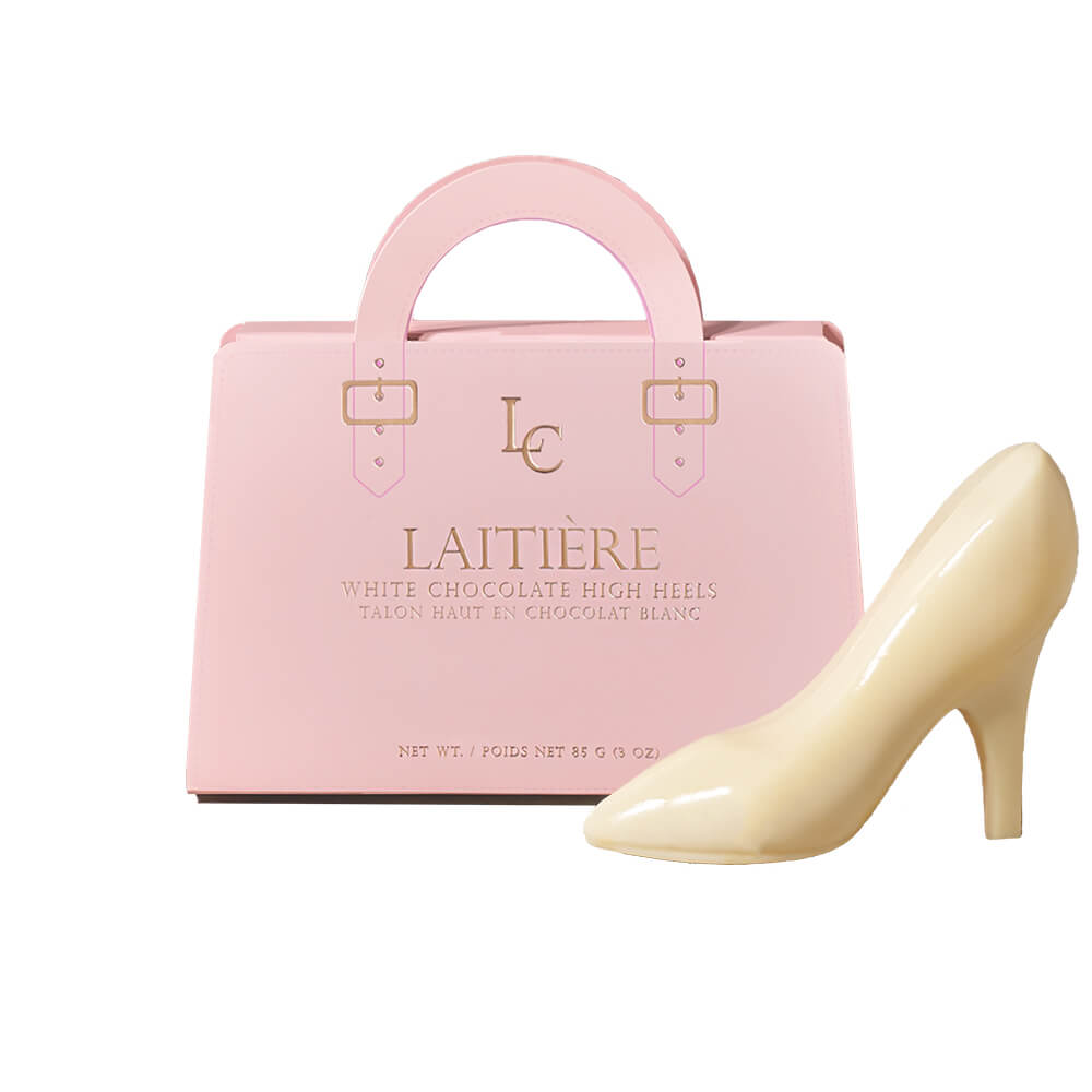 Tea Time & Chocolate Gift Box, English Breakfast tea, a collection of white chocolate high heels, assorted white chocolate truffles, a strawberry-filled milk chocolate bar, a charming pink floral mug, and a pink gift box, Gourmet Gifts from Canada Blooms - Canada Delivery