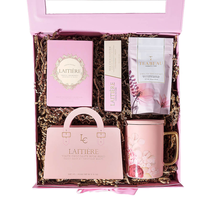 Tea Time & Chocolate Gift Box, English Breakfast tea, a collection of white chocolate high heels, assorted white chocolate truffles, a strawberry-filled milk chocolate bar, a charming pink floral mug, and a pink gift box, Gourmet Gifts from Canada Blooms - Canada Delivery