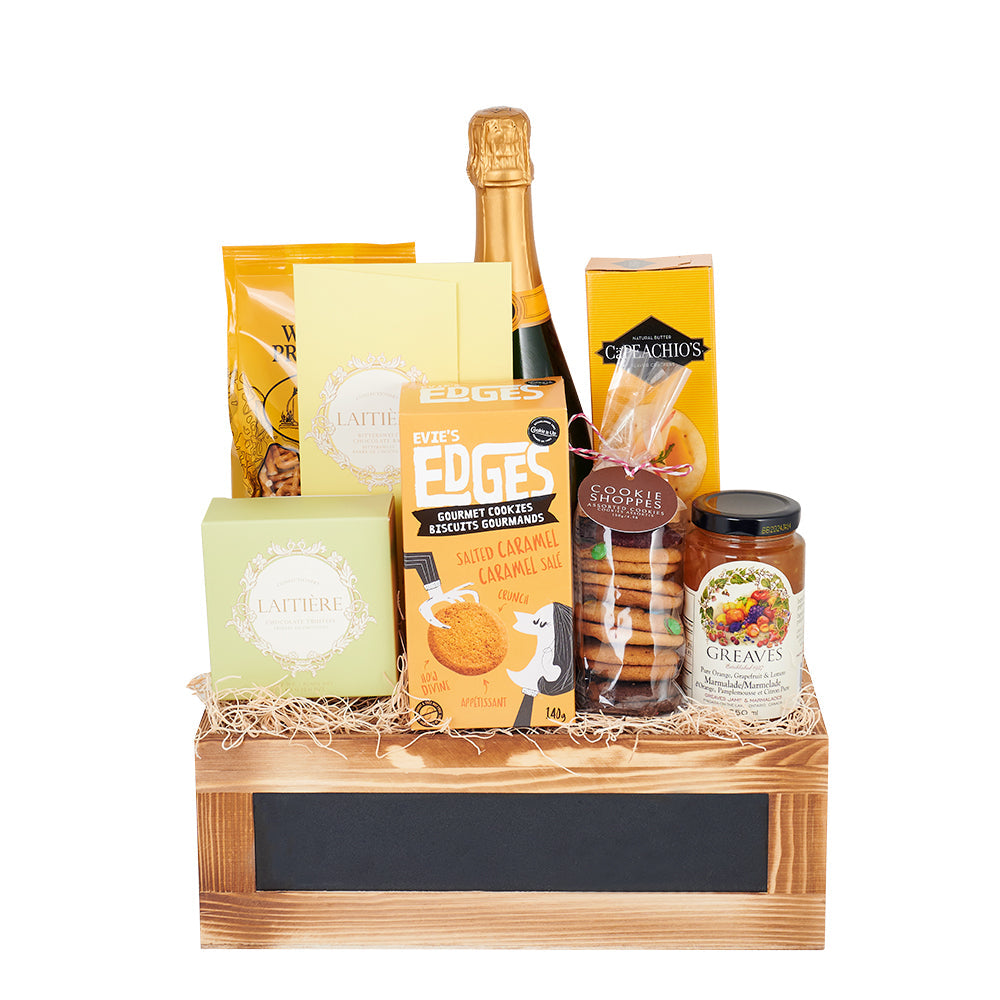The Picnic Celebration Gift Basket, rich chocolates, creamy Camembert, a bottle of sparkling wine, and more Picnic Gifts from Canada Blooms - Canada Delivery