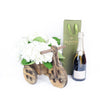Tuscan Countryside Flowers & Champagne Gift, charming bicycle-shaped planter, paired with a bottle of fine champagne, Flower Gifts from Blooms Canada - Same Day Canada Delivery.
