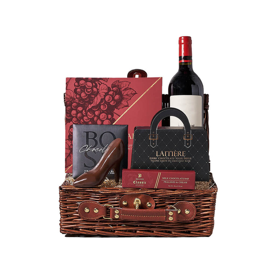 Wine & Chocolate Gift Basket, bottle of wine, dark chocolate high heels, a bar of dark chocolate, a milk chocolate pralines & cream bar, a box of wine-inspired chocolate truffles, all thoughtfully arranged in a classic wicker gift basket, Wine Gifts from Canada Blooms - Canada Delivery