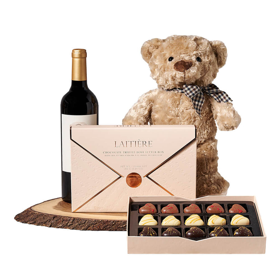 Wine & Teddy Chocolate Gift, bottle of wine, a love letter box of chocolate truffles, a plush teddy bear toy, and a live-edge serving board, Wine Gifts from Blooms Canada - Same Day Canada Delivery.